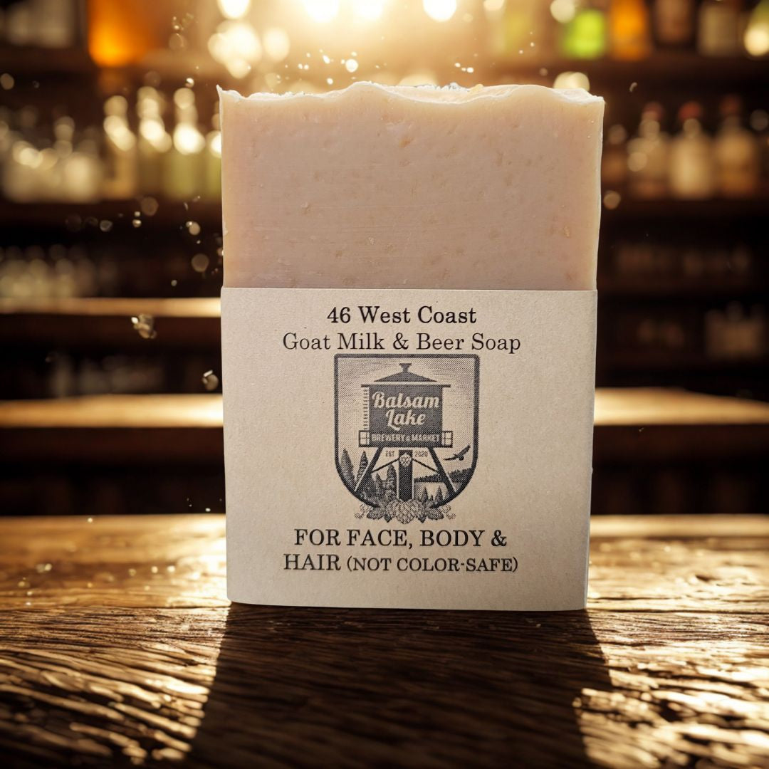 Bar of soap with a label on a wooden surface, blurred background